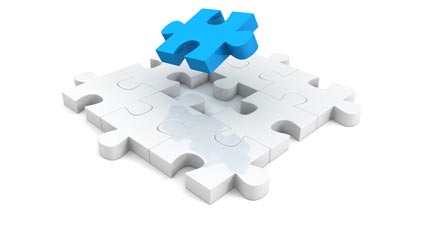 white jigsaw puzzle with blue piece falling into place